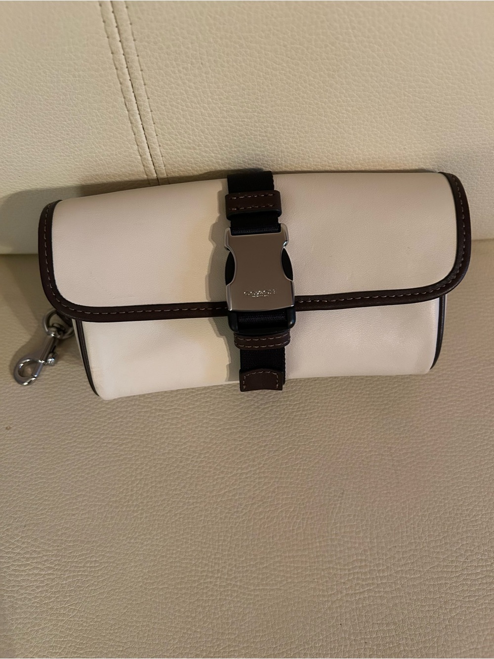 Coach Cream Leather crossbody or hip pouch with Brown Trim and Silver Buckle